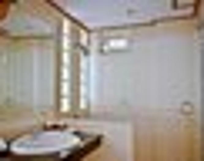Jim's Lodge - Badezimmer