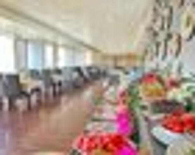 Royal City Hotel - Essen und Trinken