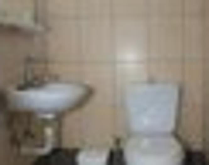 Nikos Hotel - Badezimmer