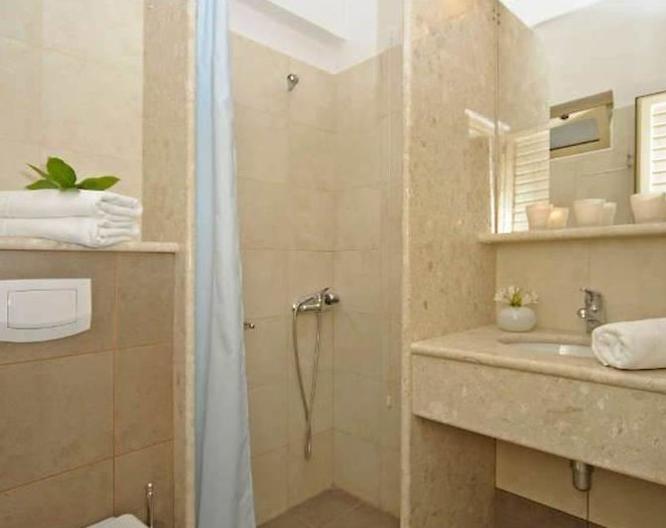 Glaros Hotel - Badezimmer