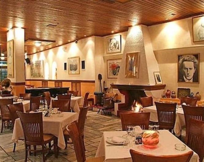 Iniohos Hotel Restaurant - Essen und Trinken