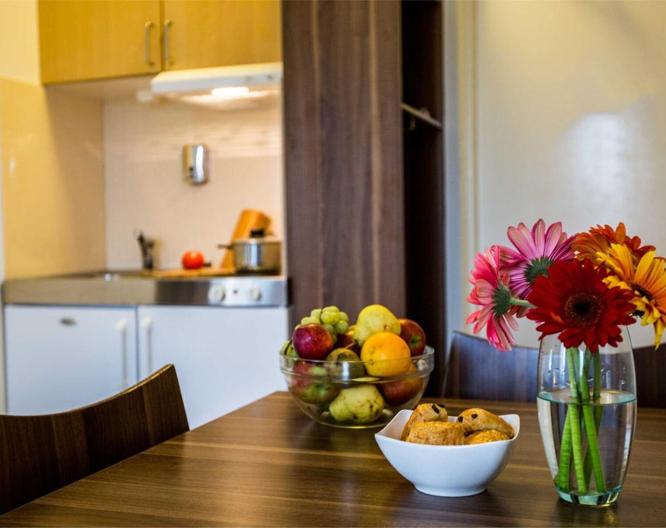 Central City Apartments - Essen und Trinken