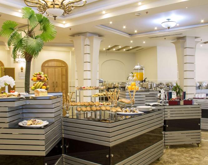 Days Inn by Wyndham Hotel Suites Amman - Essen und Trinken