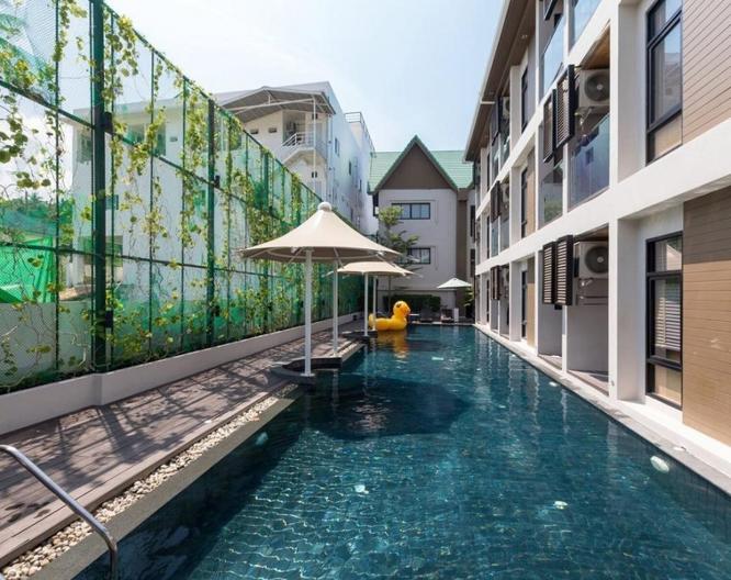 Outrigger Surin Beach Resort - Außenansicht