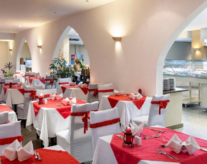 Three Corners Equinox Beach Resort - Essen und Trinken